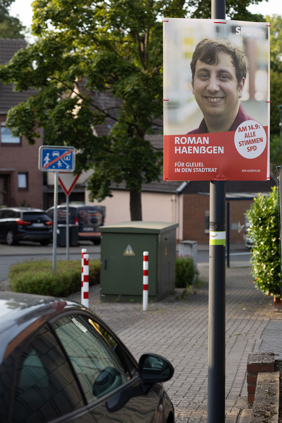 Wahlplakat im Straßenbild