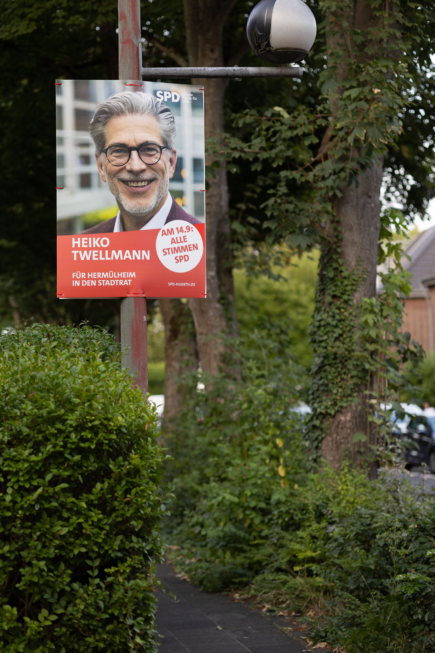 Wahlplakat im Straßenbild